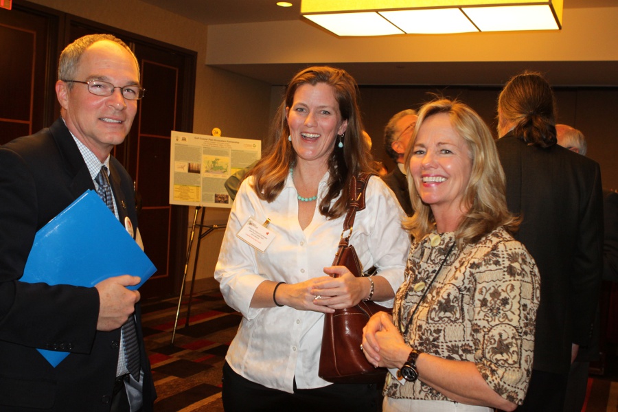 John Dondero, Cooperative Forestry, USFS (L) with Catherine Rideout, USFWS and E.J. Williams, USFS (R) (Photo by Lark Hayes)